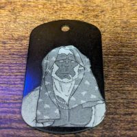 Custom dog tag featuring a laser-engraved picture
