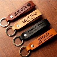 Custom leather strap keychains with engraved text designs – Best Dad, Drive Safe, coordinates, and name personalization examples
